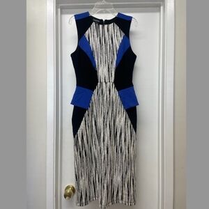 BEBE PEPLUM DRESS NEVER WORN EUC